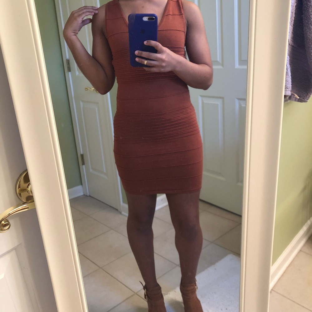 Stylish body con dress w/ laced back design